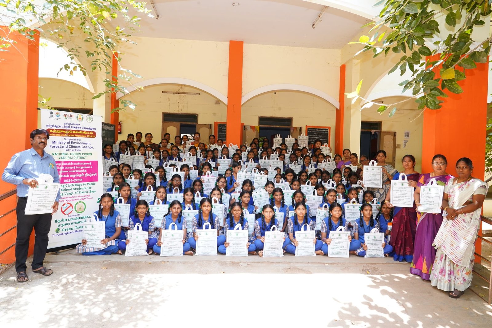 Student eco-rallies carrying anti-plastic banners and cotton bags.