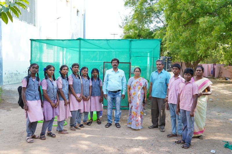 Demonstrating organic composting and bio-inputs for soil care.